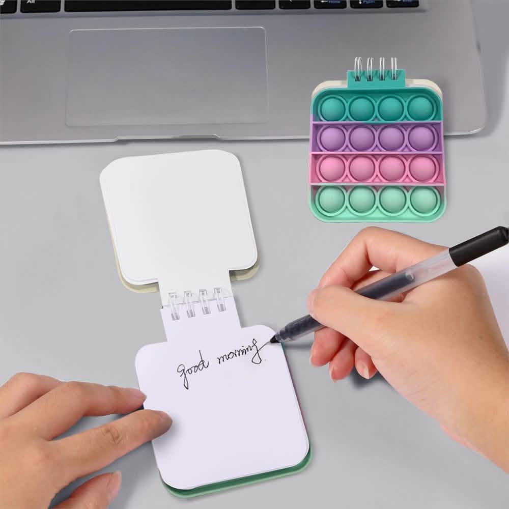 Quadratisches Push Pop Anti-Stress Notizbuch