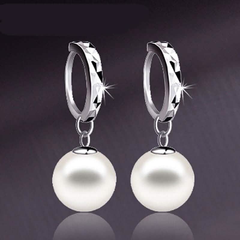 Ohrringe aus Sterlingsilber mit Diamantschliff-Perle