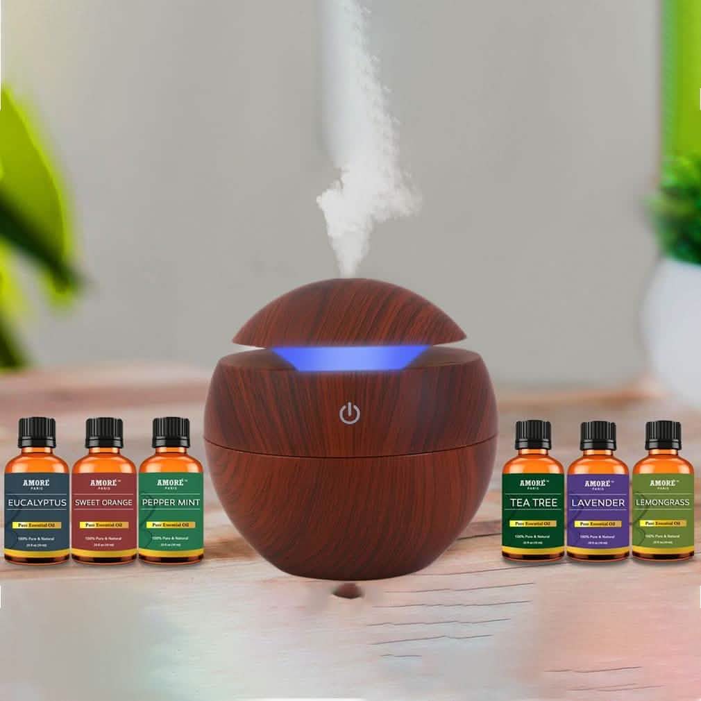 7-teilig: Ultraschall-Aromadiffusor in Holzoptik mit ätherischen Ölen