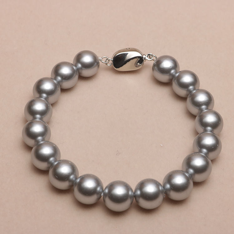 Elastisches Armband mit Perlmuttperlen