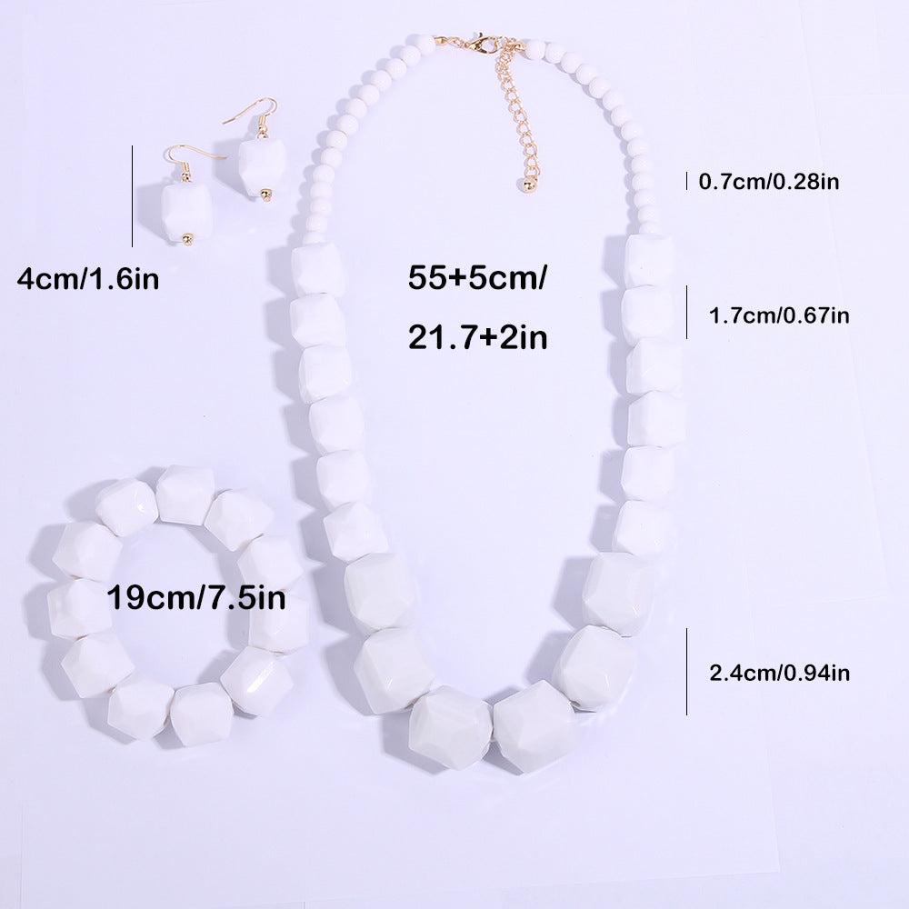 Chunky weißes geometrisches Perlen-Schmuckset aus Kunstharz