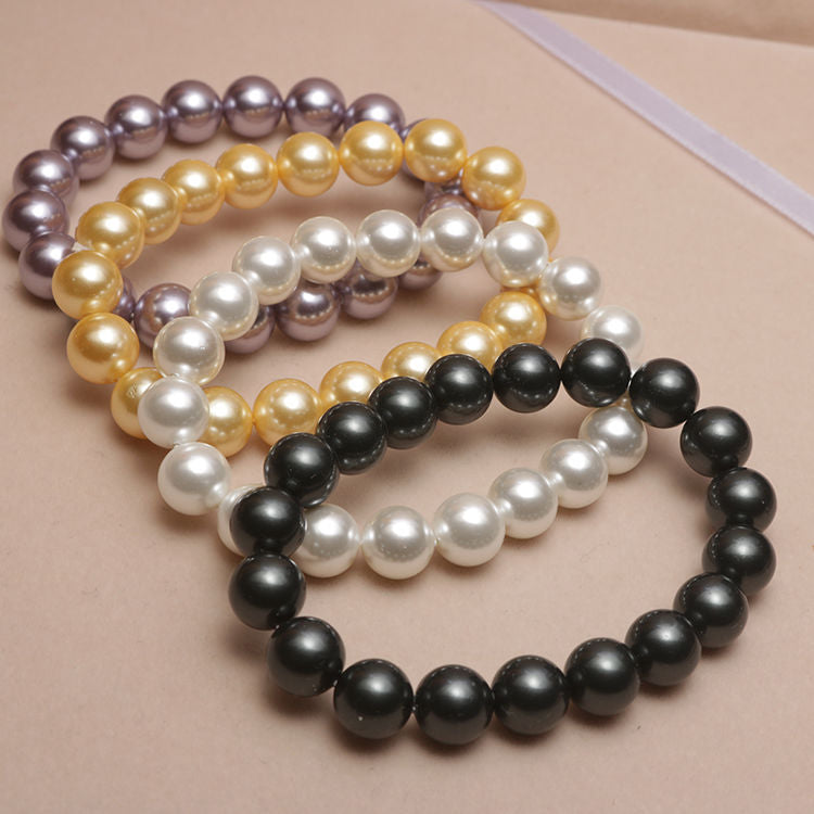 Elastisches Armband mit Perlmuttperlen