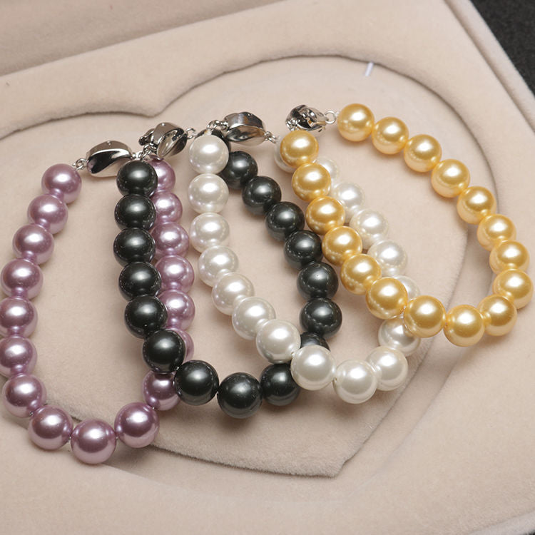 Elastisches Armband mit Perlmuttperlen