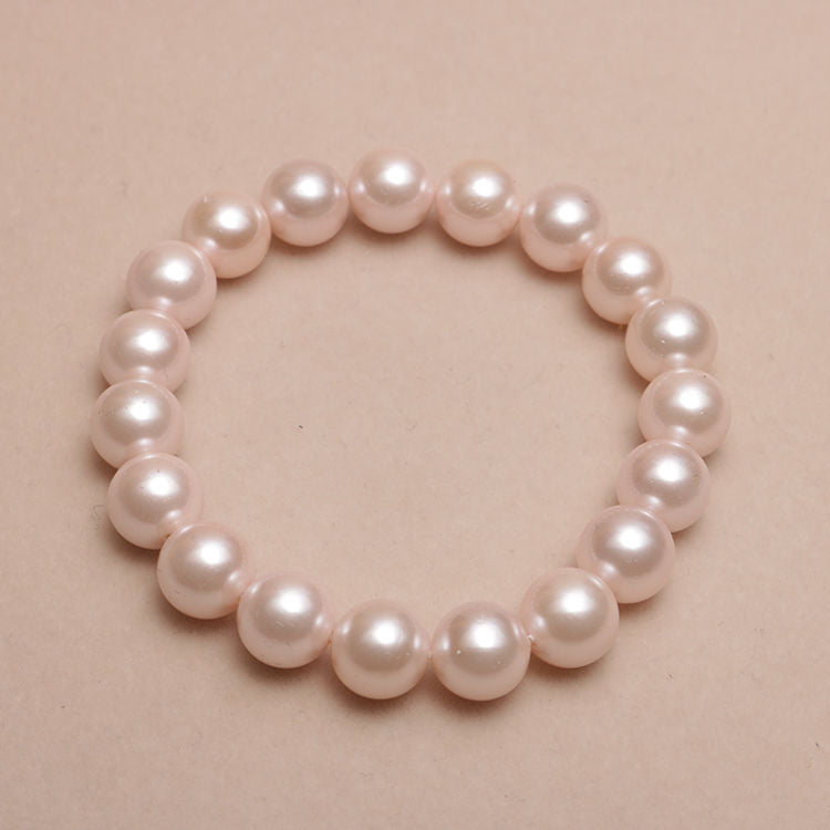 Elastisches Armband mit Perlmuttperlen