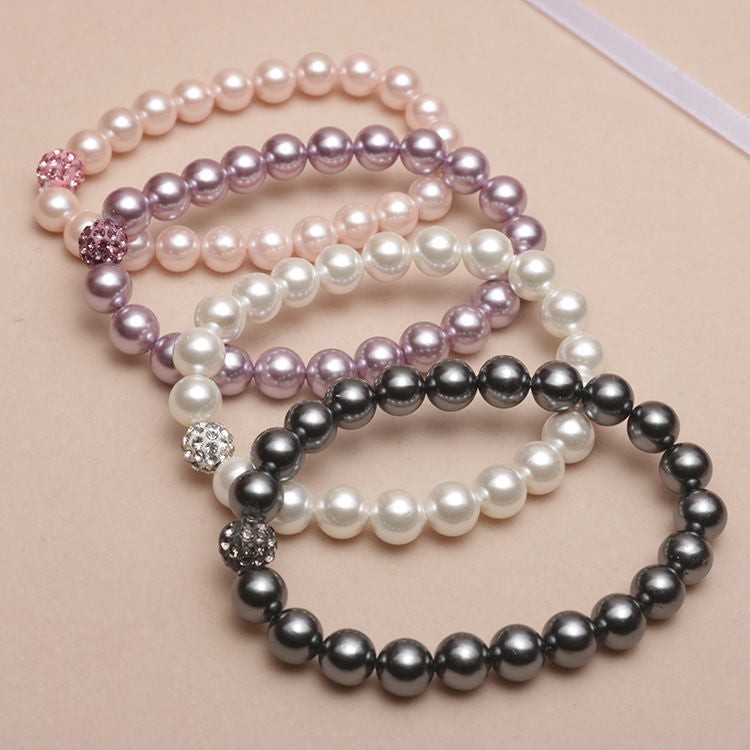 Elastisches Armband mit Perlmuttperlen