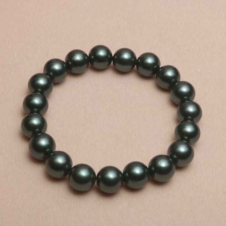 Elastisches Armband mit Perlmuttperlen