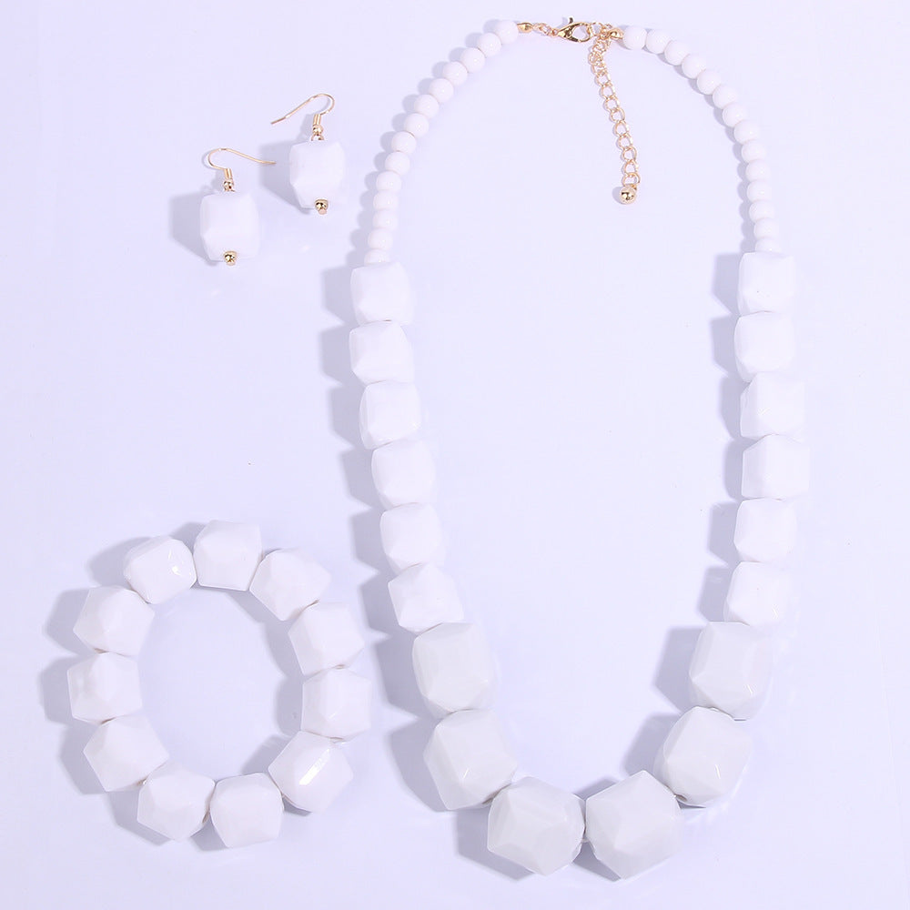 Chunky weißes geometrisches Perlen-Schmuckset aus Kunstharz