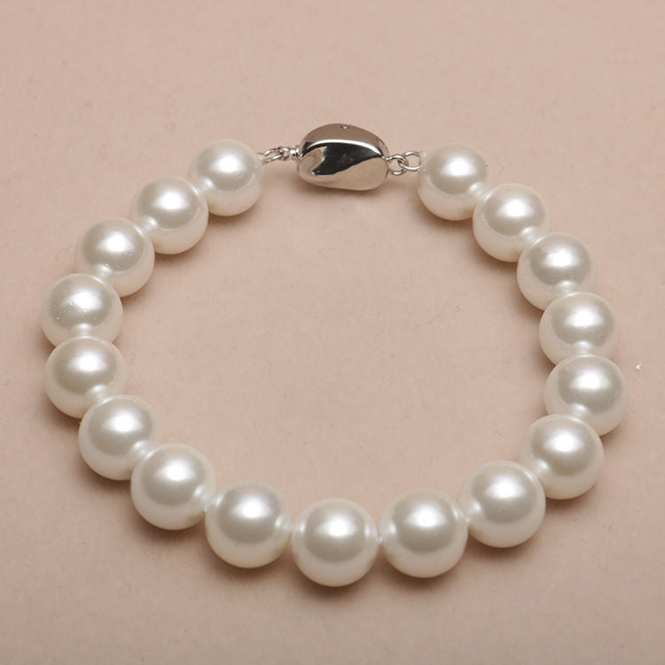 Elastisches Armband mit Perlmuttperlen