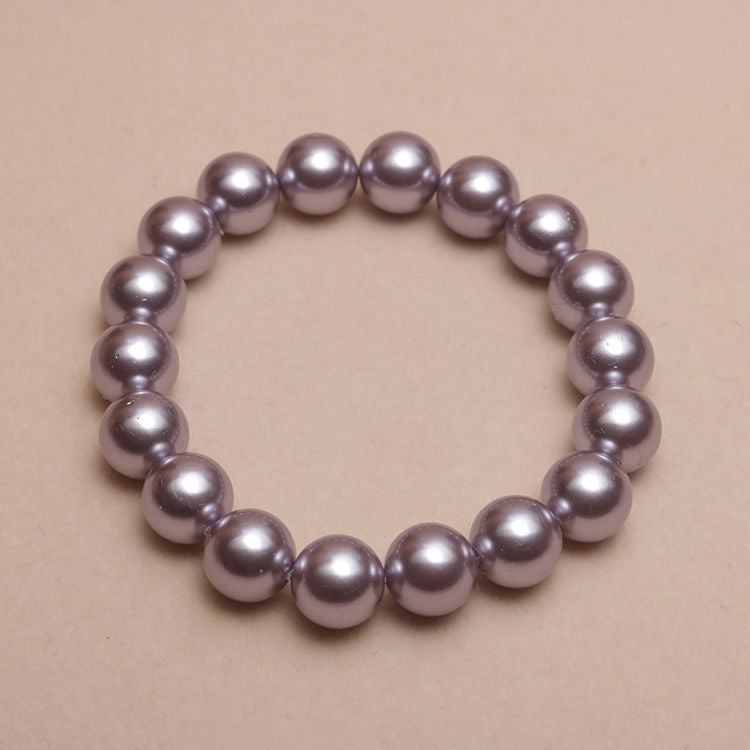 Elastisches Armband mit Perlmuttperlen