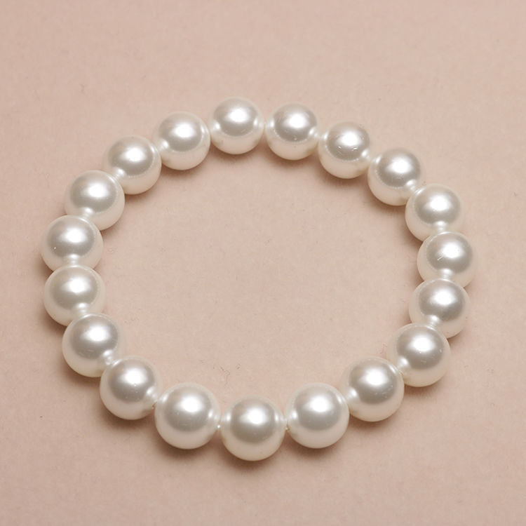 Elastisches Armband mit Perlmuttperlen