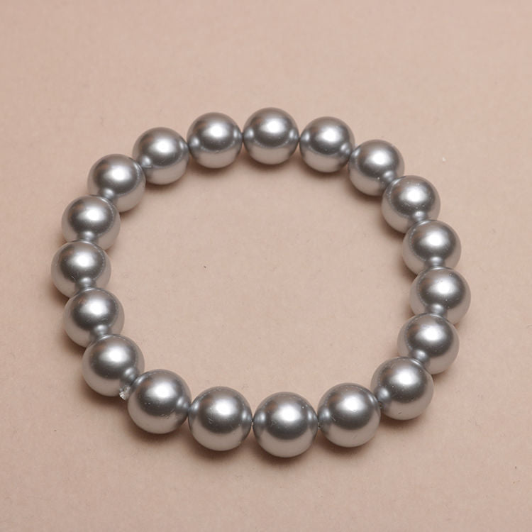 Elastisches Armband mit Perlmuttperlen