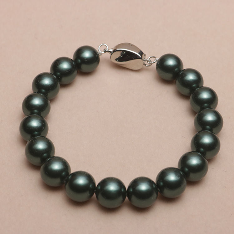 Elastisches Armband mit Perlmuttperlen