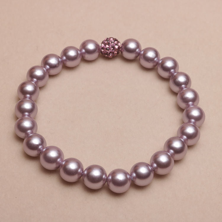 Elastisches Armband mit Perlmuttperlen