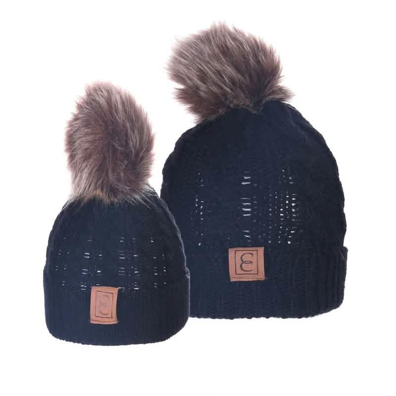 Schicke Pompon-Mützen für Mama und Kind