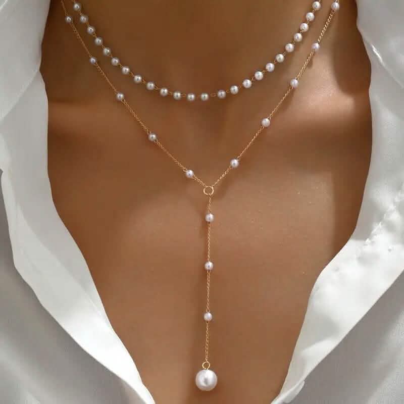 Elegante zweilagige Halskette im Vintage-Stil mit Imitationsperlen und Quastenanhänger