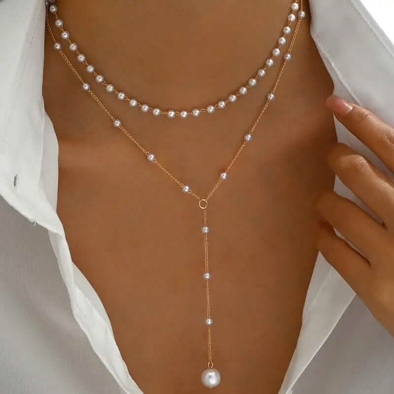 Elegante zweilagige Halskette im Vintage-Stil mit Imitationsperlen und Quastenanhänger