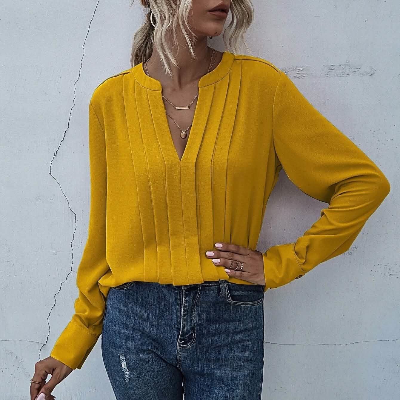 Bluse mit Kerbenhals und plissierter Verzierung