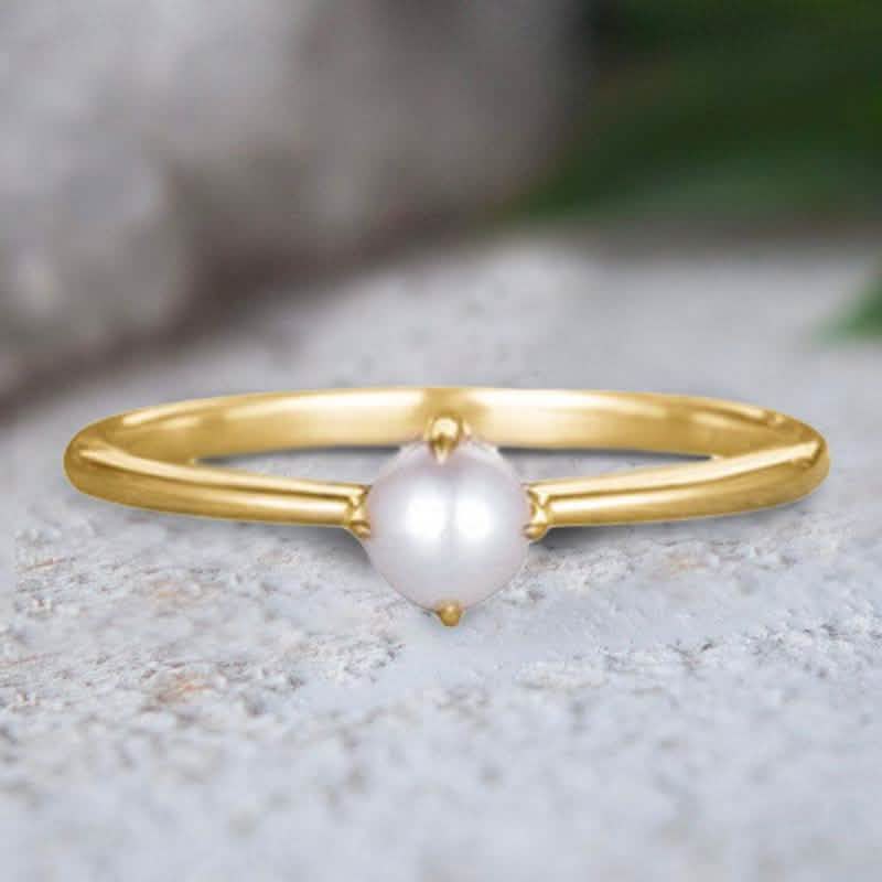 Einfacher zierlicher Perlenring aus 18 Karat Gold