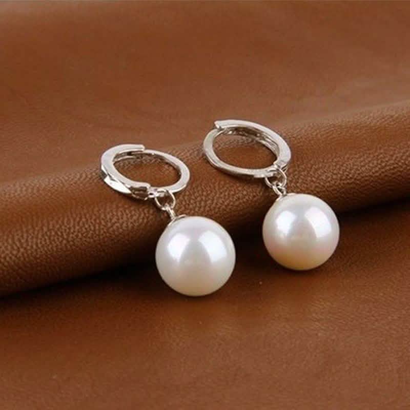 Ohrringe aus Sterlingsilber mit Diamantschliff-Perle